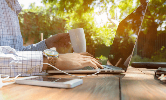 Flexibility to Match Your Lifestyle - man working on laptop on patio outdoors