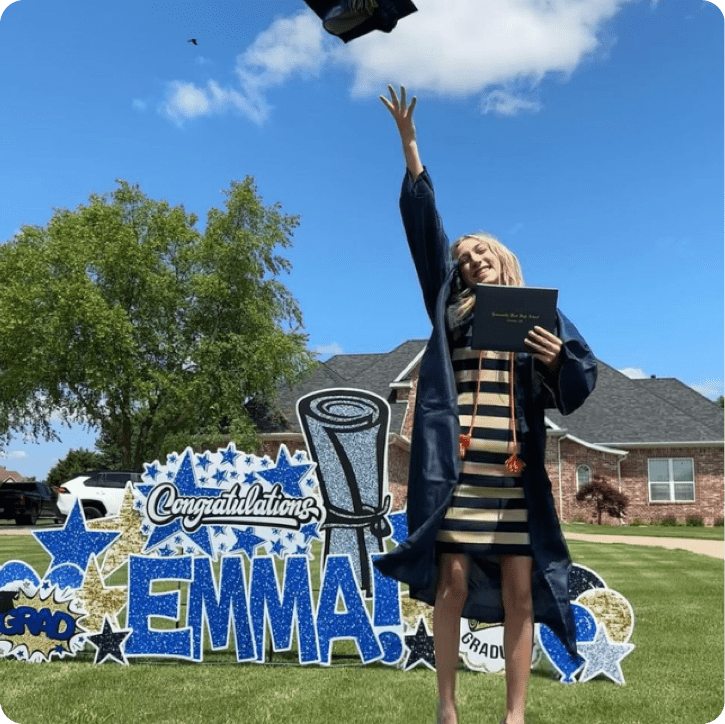 Graduation Sign with Happy Girl