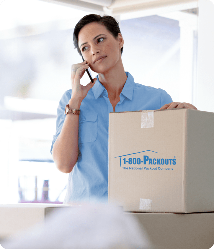 Woman on phone with moving box - 50_50