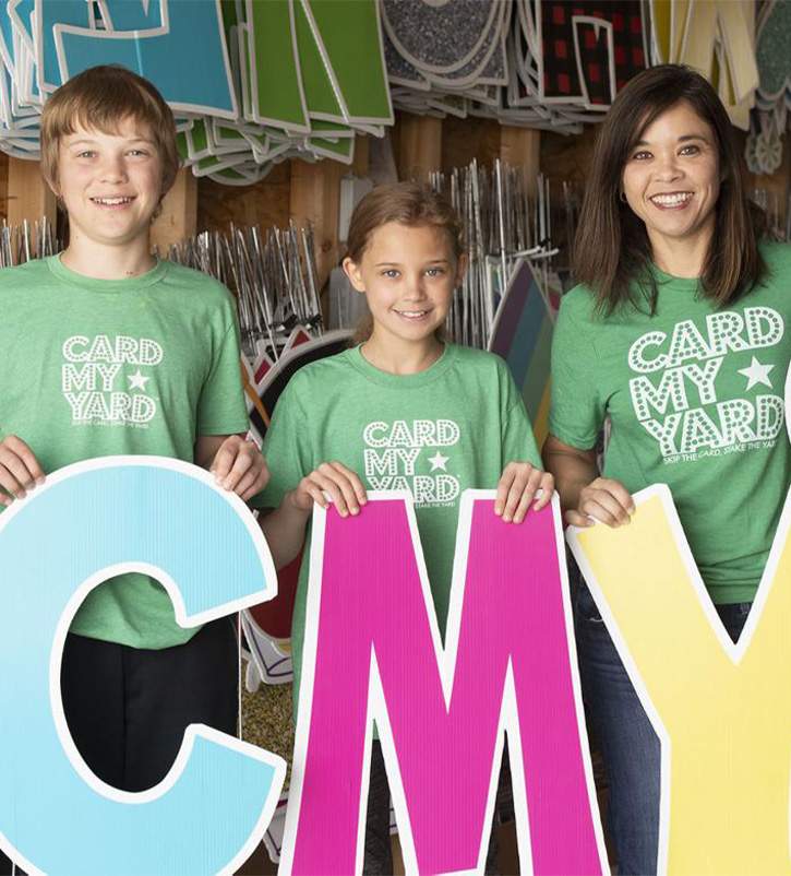 Why Choose CMY 3 happy people with sign